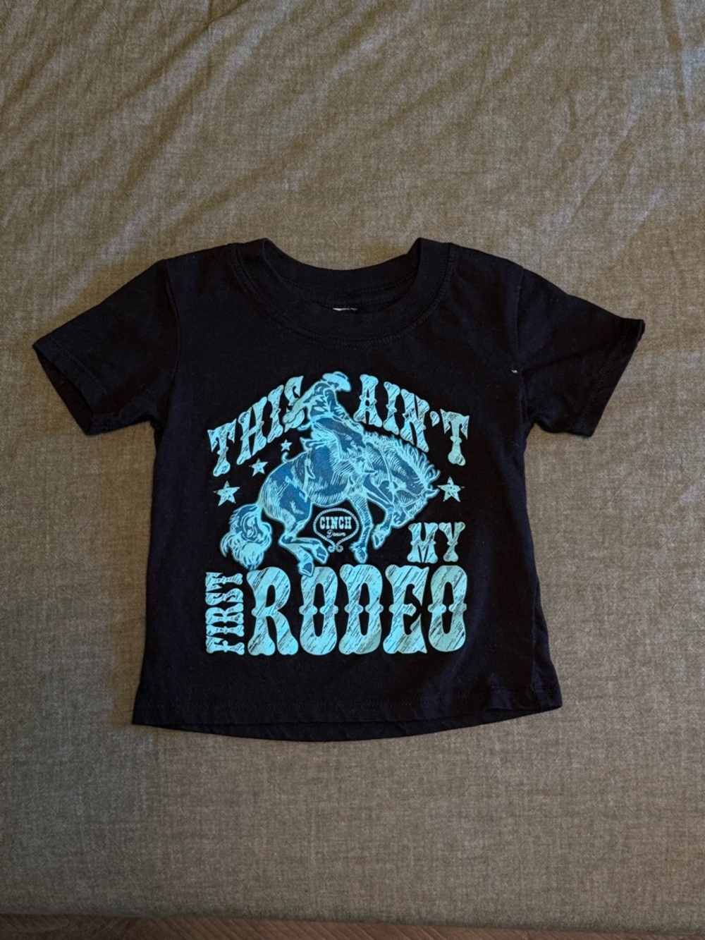 Cinch Black Tee with Bright Blue Rodeo Graphic
